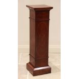 An Edwardian inlaid mahogany pedestal, of square section form, overall inlaid with chequered banding