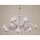 A French style eight branch chandelier, late 20th century, the glass twin baluster stem extending to