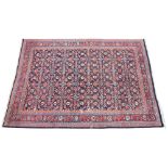 A Caucasian Ziegler carpet of large proportions, the central ground elaborately decorated with