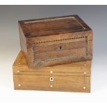 A George III oak tea caddy of rectangular form, the hinged cover opening to a later three