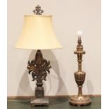 A carved giltwood table lamp, late 20th century, the scrolling leafy column raised upon an