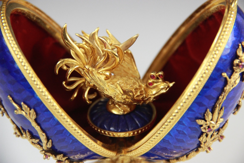 A Limited Edition musical 'Faberge Firebird Egg' by Franklin Mint, the silver gilt egg with blue - Image 8 of 12