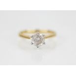 A diamond solitaire ring, the central round brilliant cut diamond weighing 1.09 carats, claw set