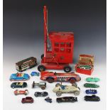 A Wells Of London tin plate clockwork model car, early 20th century, the red and black printed