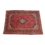 A red and blue ground full pile Persian Hashan carpet,