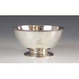 A Victorian silver bowl, of circular form on raised foot, beaded border, engraved with crest