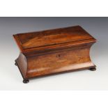 A William IV rosewood sarcophagus tea caddy, the rectangular hinged cover opening to a pair of