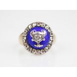 A 19th century diamond and enamel mourning ring, designed as a white metal twin-handled urn set with