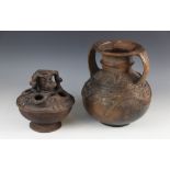 Two West African storage pots (Nigeria), the larger Nupe, 27cm high, the smaller Igbo with