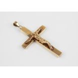 A 9ct gold crucifix pendant, marks for London 1977, 62mm x 31mm, weight 8.2gms