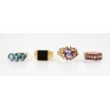 An amethyst and diamond 14ct gold ring, the central oval mixed cut amethyst measuring 9mm x 7mm,