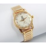 An 18ct gold Omega Automatic Seamaster wristwatch, circa 1960, the champagne dial with gold toned