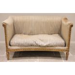 A Louis XVI style giltwood and gesso framed canape/sofa, early 19th century, in the manner of Jean-