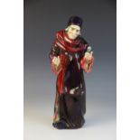 An early Royal Doulton HN1282 "The Alchemist" figure, the base with green maker's mark and "Rd.No.
