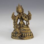 A bronze buddha, possibly Tibetan 19th century, modelled seated on a lotus throne, 11cm high