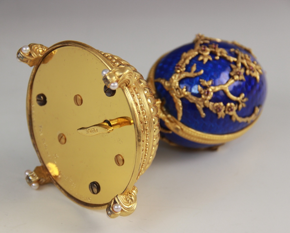 A Limited Edition musical 'Faberge Firebird Egg' by Franklin Mint, the silver gilt egg with blue - Image 9 of 12