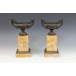 A pair of 19th century Grand Tour style bronze and marble tazza urns, each square plinth base