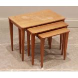 A mid 20th century teak nest of three tea tables by Gordon Russell of Broadway, each table with a