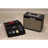 A Marshall Class 5 practice amplifier with Vox effects pedals and cables (2)