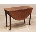 A George II mahogany drop leaf table, the oval top raised on tapering cylindrical legs terminating