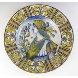 An Italian majolica charger, 19th century, decorated in typical colours with a profile portrait