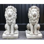 A pair of heavy reconstituted stone garden lion statues, late 20th century, each modelled seated