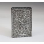 A Chinese silver filigree needle case, the two rectangular panels hinged to open both ways, each
