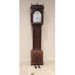 A George III oak cased eight day longcase clock, later carved, probably Banister of Lichfield, the