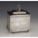 A Victorian silver tea caddy, Thomas Smily, London 1865, of rectangular form on four bun feet,