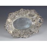 An Edwardian silver bon-bon dish, Thomas Latham & Ernest Morton, Chester 1903, of oval form on