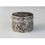 A Chinese silver pill box and cover, Wang Hing, Hong Kong, early 20th century, the circular box