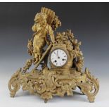 A late 19th century French gilt metal figural mantel clock, the 8cm white enamelled dial and two