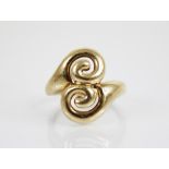 A 9ct gold scroll-design ring, plain polished with tapering shank, marks for Birmingham 2005, ring