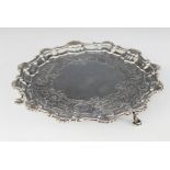 A George II silver card salver, Dorothy Sarbitt, London 1754, of circular form with shell and scroll