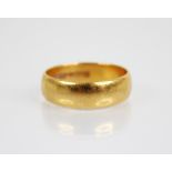 A 22ct gold wedding band, marks for 'CG&S' Birmingham 1959, ring size O 1/2, weight 5.7gms