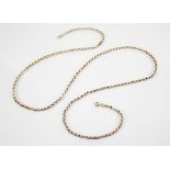 A gold-coloured belcher link chain, spring ring and loop fastening, loop with 9ct gold hallmarks for