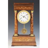 A late 19th century Austrian rosewood and marquetry portico clock, the suspended 10cm white