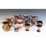 A collection of copper lustre jugs, to include a pair of jugs with relief moulded rose detail,