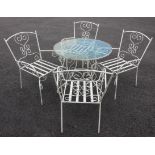 A painted wrought iron bistro/patio set, mid 20th century, each of the four chairs with an