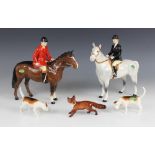 A Beswick huntswoman on grey horse, model No. 1730 (style two), discontinued 1995, 21.5cm high, with