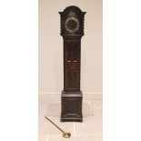 A 1920's oak cased grandmother clock, the arched hood with freestanding barley twist pillars