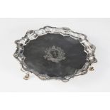 A George II silver card salver, Richard Rugg, London 1758, of circular form with shell and scroll