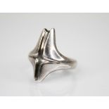 Henning Koppel for Georg Jensen, a silver ring, design no. 129, ring size O, stamped with oval