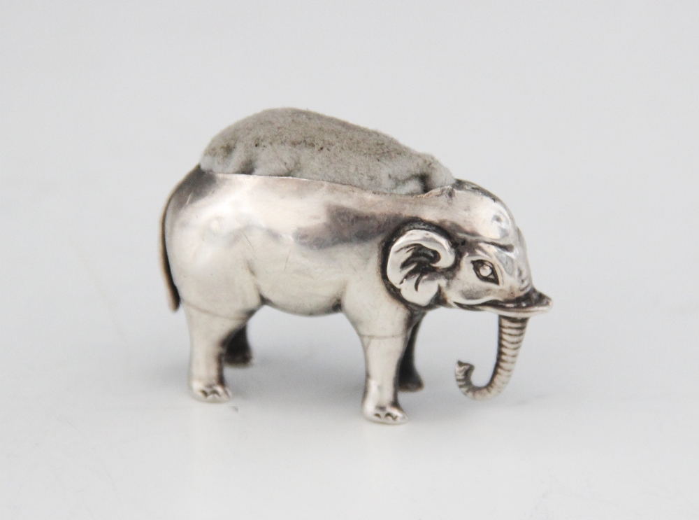 A silver novelty elephant pin cushion, Adie & Lovekin Ltd, Birmingham (date letter worn), 4.3cm