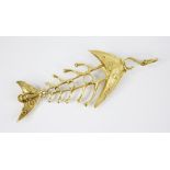 A gold coloured abstract fish pendant, with plain polished pierced skeletal body, the articulated