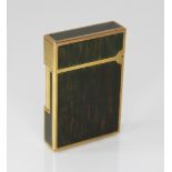 An St Dupont Laque de Chine gold plated pocket lighter, of rectangular form with wood effect