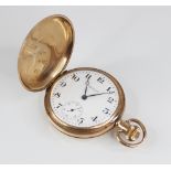 A George V 9ct gold Waltham full hunter pocket watch, the white enamel dial with Arabic numerals and
