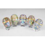 Five Halcyon Days Easter eggs, comprising; 1999, 2000, 2002, 2003, and 2004, 6cm high (5)