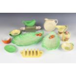 A collection of Carlton Ware tea wares to include a four division toast rack, two cabbage leaf