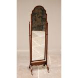 A mahogany framed cheval mirror, 20th century, the arched mirrored plate within a plain frame,